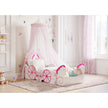 Horse and carriage themed bed frame in a modernly decorated bedroom.