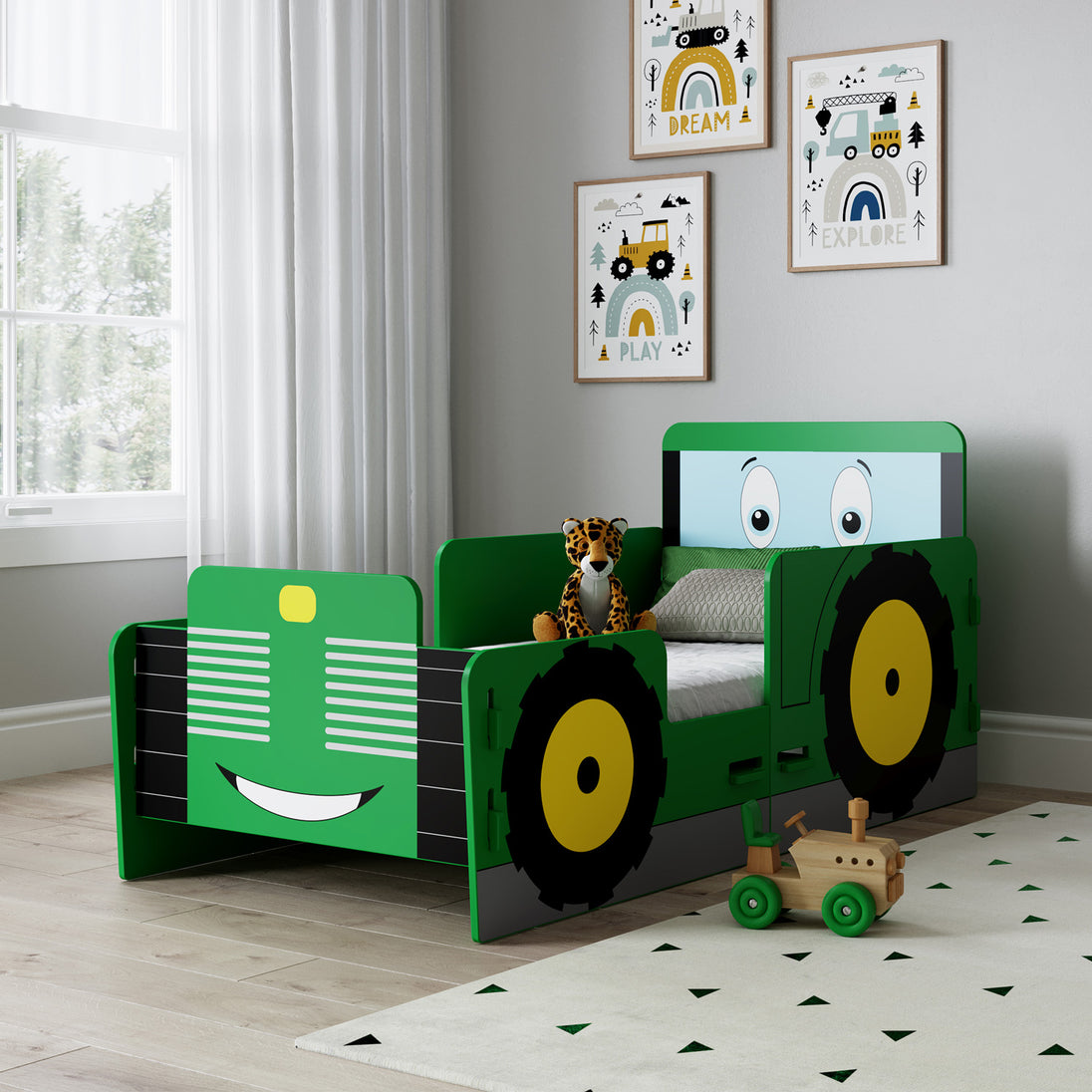 Toddler bed in a modernly decorated bedroom.