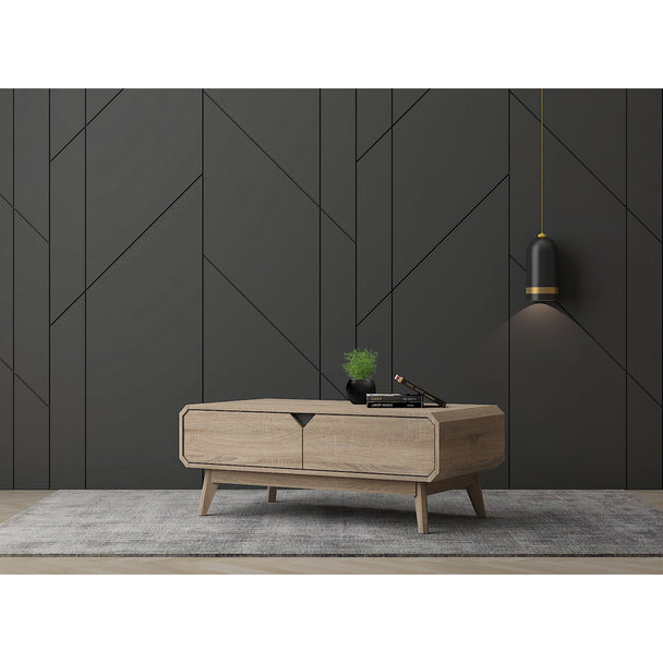 Coffee table in a modernly decorated living room. It shows the 2 built-in drawers and top surface area in use.