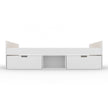 White storage unit with drawers and open shelf on a white background