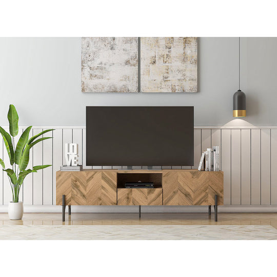 TV cabinet in a modernly decorated living room. It shows the 2 cupboards, internal drawer and 1 shelf in use with a TV on top.