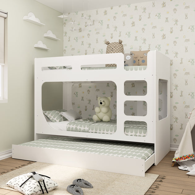 Bunk bed in a modernly decorated bed room. The included trundle is pulled-out for show.