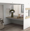 Children's room with a wooden shelf, green lamp, and toys.