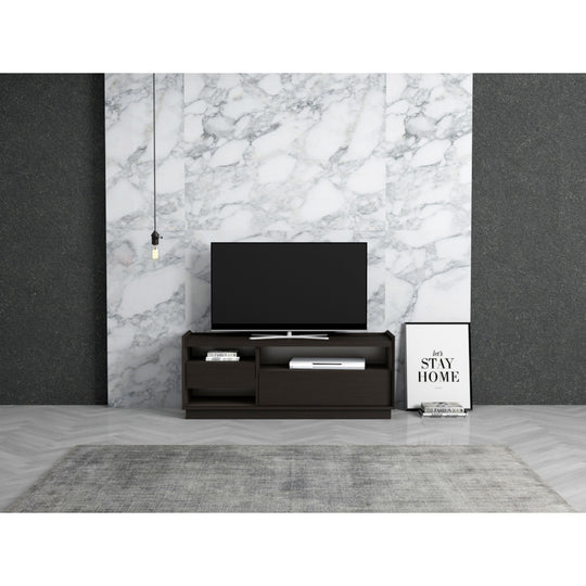 TV cabinet in a modernly decorated living room. It shows the 3 shelfs in use and a TV on top.